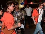 Shah Rukh Khan at the airport with his Hermès cross-body backpack