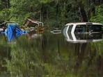STATESBORO, GEORGIA - AUGUST 7: Trucks are submerged after excessive rains caused flooding on August 7, 2024 in Statesboro, Georgia.. (Photo by Megan Varner / GETTY IMAGES NORTH AMERICA / Getty Images via AFP)(Getty Images via AFP) STATESBORO, GEORGIA - AUGUST 7: Trucks are submerged after excessive rains caused flooding on August 7, 2024 in Statesboro, Georgia.. (Photo by Megan Varner / GETTY IMAGES NORTH AMERICA / Getty Images via AFP)(Getty Images via AFP)