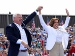 FILE PHOTO: U.S. Vice President and Democratic presidential candidate Kamala Harris and her running mate Minnesota Governor Tim Walz hold a campaign event in Eau Claire, Wisconsin, U.S., August 7, 2024. REUTERS/Kevin Mohatt/File Photo(REUTERS)