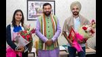 Haryana chief minister Nayab Singh Saini with Paris Olympics bronze medallists Manu Bhaker and Sarabjot Singh at his residence in Chandigarh on Friday. (HT Photo) Haryana chief minister Nayab Singh Saini with Paris Olympics bronze medallists Manu Bhaker and Sarabjot Singh at his residence in Chandigarh on Friday. (HT Photo)