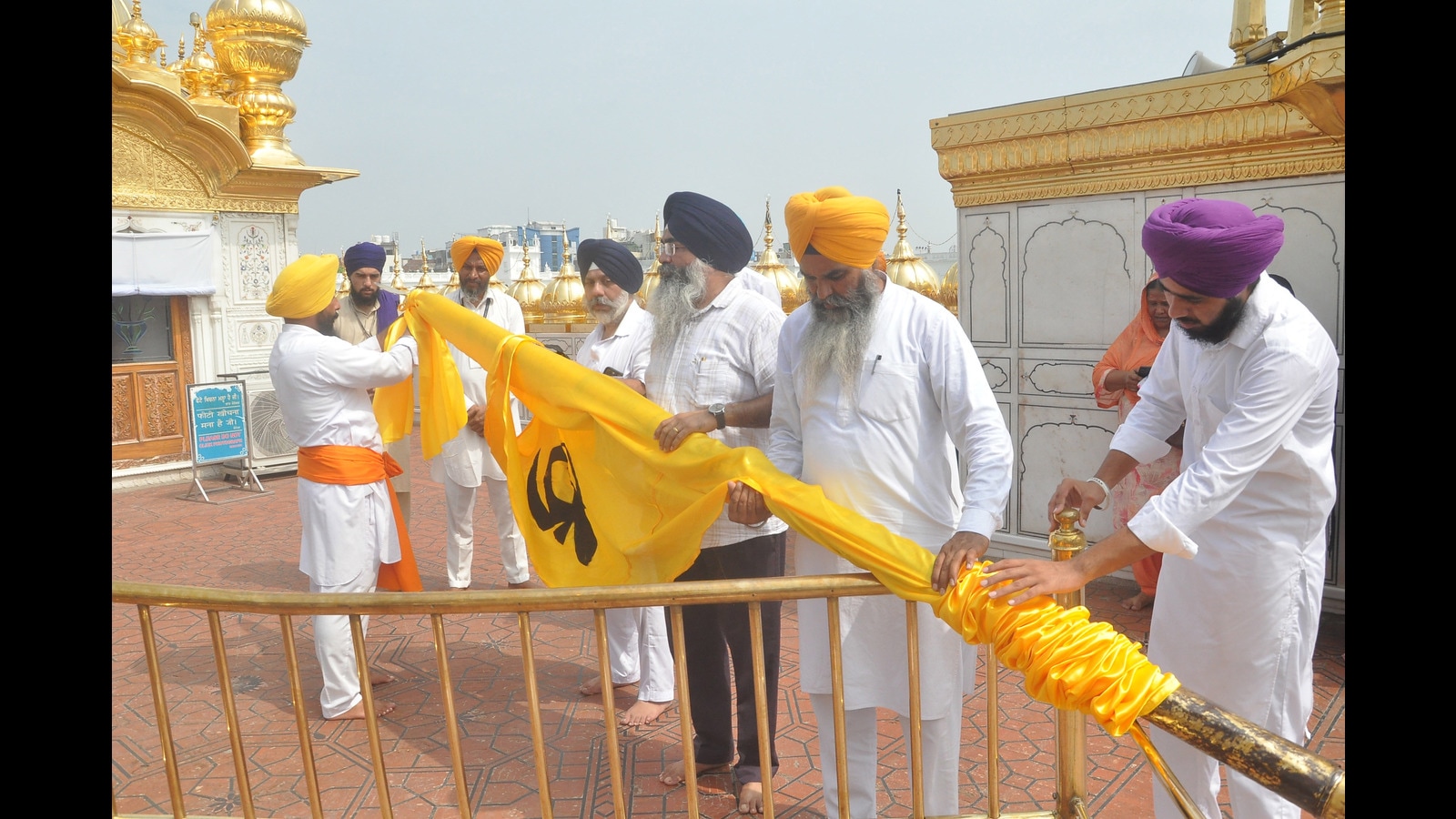 Nishan Sahib in Golden Temple dons basanti