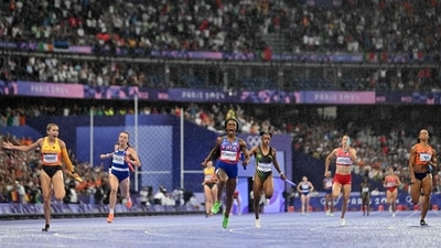 There were incredible scenes at a rain-soaked Stade de France as the USA won the women's 4x100m relay despite being fourth at the start of the anchor run. It was talisman Sha'Carri Richardson who shot up to the front and even led the final quarter of her 100m stretch. (AFP) There were incredible scenes at a rain-soaked Stade de France as the USA won the women's 4x100m relay despite being fourth at the start of the anchor run. It was talisman Sha'Carri Richardson who shot up to the front and even led the final quarter of her 100m stretch. (AFP)