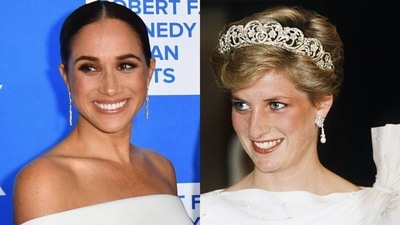Meghan Markle's holds Princess Diana's aquamarine ring (Getty Images) Meghan Markle's holds Princess Diana's aquamarine ring (Getty Images)