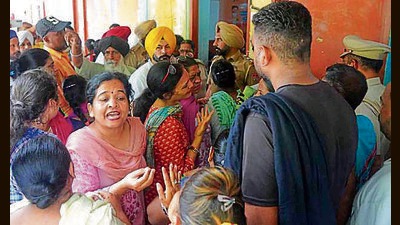 Parents protested in the Government Primary Smart School Jamalpur on Friday after the students alleged a teacher of beating them in Ludhiana on Friday, August 09, 2024. (HT Photo) Parents protested in the Government Primary Smart School Jamalpur on Friday after the students alleged a teacher of beating them in Ludhiana on Friday, August 09, 2024. (HT Photo)