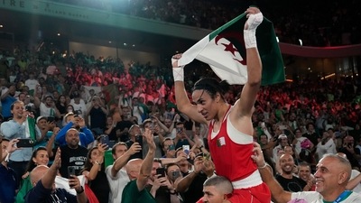 Algeria's Imane Khelif celebrates after defeating China's Yang Liu to win gold in their women's 66 kg final boxing match at the 2024 Summer Olympics (AP) Algeria's Imane Khelif celebrates after defeating China's Yang Liu to win gold in their women's 66 kg final boxing match at the 2024 Summer Olympics (AP)