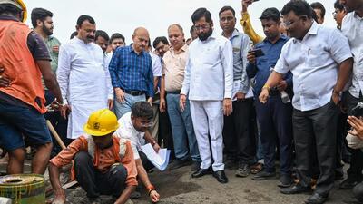 Thane, India - Aug 09, 2024: On Friday, Maharashtra Chief Minister Eknath Shinde inspected the Mumbai-Nashik Highway. He directed various agencies, including the NHAI, Maharashtra State Road Development Corporation (MSRDC), the state public works department, and the traffic police department, to immediately repair potholes on the Mumbai-Nashik Highway. These potholes are causing significant traffic jams and serious problems for commuters.Mumbai, India.09, 2024. (Photo by Raju Shinde/ Hindustan Times) (Hindustan Times) Thane, India - Aug 09, 2024: On Friday, Maharashtra Chief Minister Eknath Shinde inspected the Mumbai-Nashik Highway. He directed various agencies, including the NHAI, Maharashtra State Road Development Corporation (MSRDC), the state public works department, and the traffic police department, to immediately repair potholes on the Mumbai-Nashik Highway. These potholes are causing significant traffic jams and serious problems for commuters.Mumbai, India.09, 2024. (Photo by Raju Shinde/ Hindustan Times) (Hindustan Times)