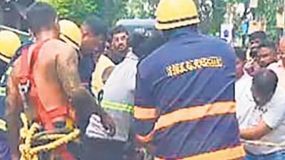The fire brigade, which was intimated at 4.18pm, reached the spot at 4.29pm, followed by civic and police officials. They successfully rescued Latekar, who is out of danger but under observation at Shatabdi Hospital in Kandivli. Wakode too was taken to Shatabdi Hospital but was declared brought dead The fire brigade, which was intimated at 4.18pm, reached the spot at 4.29pm, followed by civic and police officials. They successfully rescued Latekar, who is out of danger but under observation at Shatabdi Hospital in Kandivli. Wakode too was taken to Shatabdi Hospital but was declared brought dead