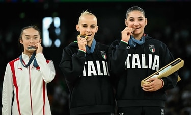 Chinese gymnast Zhou Yaqin is going viral as fans praised her as well as turned her into a meme after she stood on the Olympic podium Chinese gymnast Zhou Yaqin is going viral as fans praised her as well as turned her into a meme after she stood on the Olympic podium