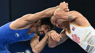 Aman was dominant in his bronze-medal match against Puerto Rico's Darian Cruz. The Indian won the bout 12-5. (AFP) Aman was dominant in his bronze-medal match against Puerto Rico's Darian Cruz. The Indian won the bout 12-5. (AFP)