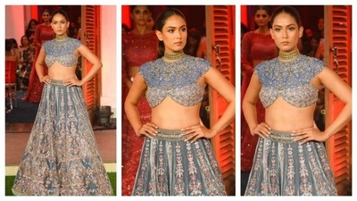 Mira Rajput dazzled in a gorgeous greyish-blue lehenga. She stole the spotlight at the Bridal Couture 2024 presentation for designer label JADE by Monica and Karishma's (JADE by MK.) Her lehenga featured a bralette with gota kadhai and sequin embellishments in her skirt. She accessorised with a golden choker neckpiece. (Instagram/@viralbhayani) Mira Rajput dazzled in a gorgeous greyish-blue lehenga. She stole the spotlight at the Bridal Couture 2024 presentation for designer label JADE by Monica and Karishma's (JADE by MK.) Her lehenga featured a bralette with gota kadhai and sequin embellishments in her skirt. She accessorised with a golden choker neckpiece. (Instagram/@viralbhayani)