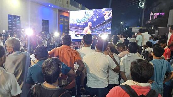 A giant screen set up to watch the Olympic final outside Neeraj Chopra’s home. (HT)