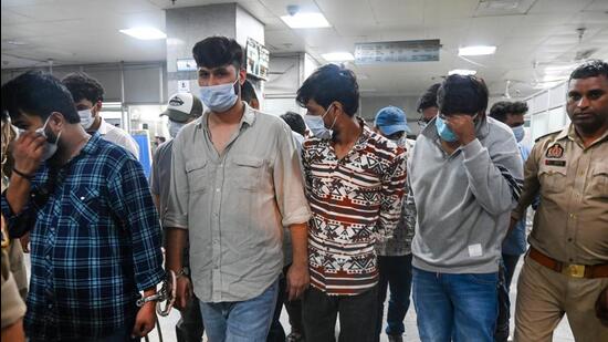 According to Rambadan Singh, deputy commissioner of police, Noida, the suspects were working out from a rented office in Sector 59, Noida. (Sunil Ghosh/HT Photo)