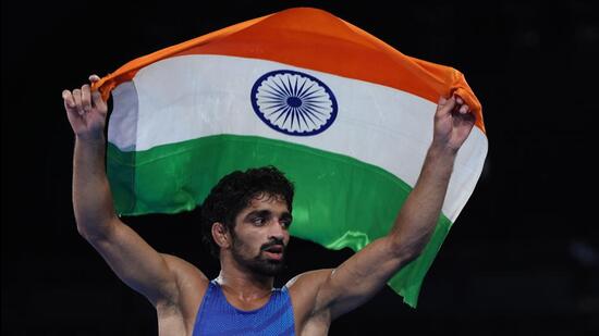 Aman Sehrawat celebrates defeating Darian Toi Cruz of Puerto Rico during their Men Freestyle 57kg Bronze Medal match of the Wrestling competitions in the Paris 2024 Olympic Games, at the Champs-de-Mars Arena in Paris, France,on Friday. (EPA-EFE)