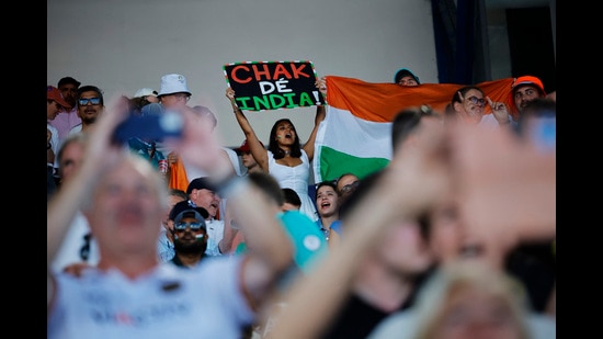 Paris 2024 Olympics - Hockey - Men's Semi-final - Germany vs India - Yves-du-Manoir Stadium, Colombes, France - August 06, 2024. An Indian fan cheers for her team. REUTERS/Anushree Fadnavis (REUTERS)