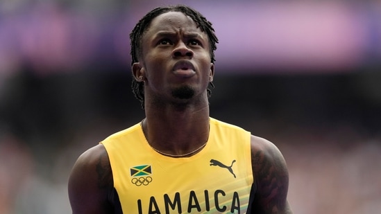 Ackeem Blake, of Jamaica, reacts after qualifying in a men's 100 meters round 1 heat at the 2024 Summer Olympics(AP)