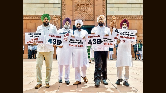 Punjab Congress MPs Charanjit Singh Channi, Amrinder Singh Raja Warring, Gurjeet Singh Aujla, Amar Singh and Sukhjinder Singh Randhawa hold a protest outside Makar Dwar demanding the rollback of Section 43B(h) of the Income Tax Act, introduced through the Finance Act 2023, at Parliament House in New Delhi on Friday. (ANI)