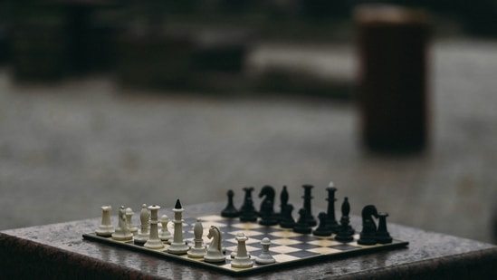 A video shows Russian chess champion Amina Abakarova smearing something on a chessboard. (Unsplash/Eugene Chystiakov)