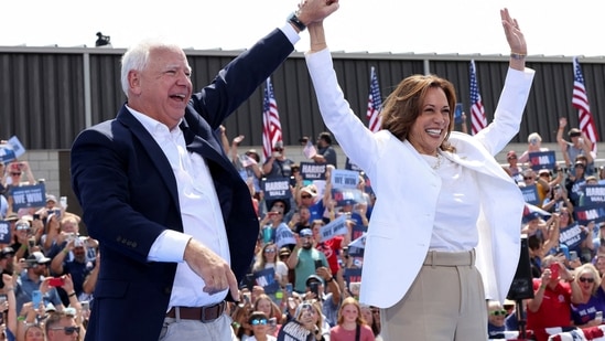 FILE PHOTO: U.S. Vice President and Democratic presidential candidate Kamala Harris and her running mate Minnesota Governor Tim Walz hold a campaign event in Eau Claire, Wisconsin, U.S., August 7, 2024. REUTERS/Kevin Mohatt/File Photo(REUTERS)