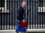 Britain's Home Secretary Yvette Cooper leaves Number 10 Downing Street in London.