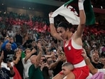 Algeria's Imane Khelif celebrates after defeating China's Yang Liu to win gold in their women's 66 kg final boxing match at the 2024 Summer Olympics(AP) Algeria's Imane Khelif celebrates after defeating China's Yang Liu to win gold in their women's 66 kg final boxing match at the 2024 Summer Olympics(AP)