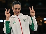 Paris Olympics gold medallist Algeria's Imane Khelif poses on the podium