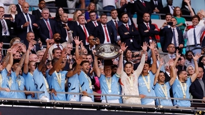 Manchester City's Kevin De Bruyne lifts the trophy as he celebrates with teammates after winning the Community Shield (Action Images via Reuters)