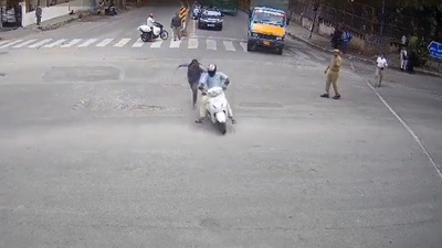 The intense pursuit, captured on CCTV and widely shared on social media, took place at a crowded Sadashiva Nagar junction. (X)