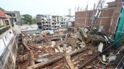 The two-storey house that collapsed in Model Town in northwest Delhi during heavy rain on Saturday afternoon. (HT Photo) The two-storey house that collapsed in Model Town in northwest Delhi during heavy rain on Saturday afternoon. (HT Photo)