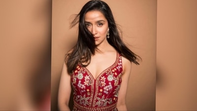 With the help of hair stylist Nikita Menon, she styled her luscious locks into soft curls, parted to the side and cascading elegantly down her shoulders. This hairdo perfectly complemented her chic ensemble. (Instagram/@shraddhakapoor) With the help of hair stylist Nikita Menon, she styled her luscious locks into soft curls, parted to the side and cascading elegantly down her shoulders. This hairdo perfectly complemented her chic ensemble. (Instagram/@shraddhakapoor)