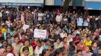 Medical students protest demanding justice in the murder of a woman postgraduate trainee doctor at the state-run RG Kar Medical College and Hospital in Kolkata. (PTI) Medical students protest demanding justice in the murder of a woman postgraduate trainee doctor at the state-run RG Kar Medical College and Hospital in Kolkata. (PTI)