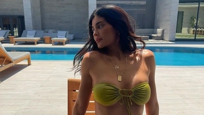 It's no secret that Kylie Jenner enjoys flaunting her famous figure in bikinis in vibrant colours. She posted a series of poolside pictures in July 2023 of her wearing a strapless green bikini. It's no secret that Kylie Jenner enjoys flaunting her famous figure in bikinis in vibrant colours. She posted a series of poolside pictures in July 2023 of her wearing a strapless green bikini.
