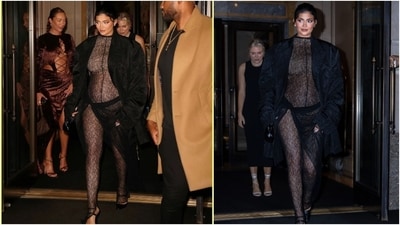 While stepping out in New York during her second pregnancy, Kylie Jenner proved that fashion never has to take a backseat. The beauty mogul wore a sheer lace catsuit custom-designed by LaQuan Smith. She paired it with a black coat, high heels, brown lips, hair tucked in a top bun, and siren eyes. (Instagram) While stepping out in New York during her second pregnancy, Kylie Jenner proved that fashion never has to take a backseat. The beauty mogul wore a sheer lace catsuit custom-designed by LaQuan Smith. She paired it with a black coat, high heels, brown lips, hair tucked in a top bun, and siren eyes. (Instagram)
