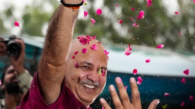 AAP leader Manish Sisodia waves to supporters after being released from Tihar jail (PTI) AAP leader Manish Sisodia waves to supporters after being released from Tihar jail (PTI)