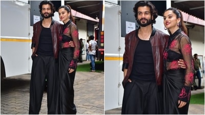 Taapsee Pannu wore a black silk saree to promote Phir Aayi Hasseen Dillruba with Sunny Kaushal. She draped the saree like a skirt and styled it with a tube bralette and a sheer embroidered black shirt. Meanwhile, Sunny complemented her in a black tank top, matching baggy pants, and a wine-red leather shacket. (Instagram) Taapsee Pannu wore a black silk saree to promote Phir Aayi Hasseen Dillruba with Sunny Kaushal. She draped the saree like a skirt and styled it with a tube bralette and a sheer embroidered black shirt. Meanwhile, Sunny complemented her in a black tank top, matching baggy pants, and a wine-red leather shacket. (Instagram)