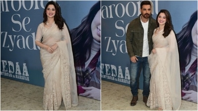Tamannaah Bhatia promoted Vedaa in an organza saree embroidered with detailed floral work. She styled the nine yards with a half-sleeved embroidered blouse, a pearl necklace, striking makeup, and loose tresses. (Instagram) Tamannaah Bhatia promoted Vedaa in an organza saree embroidered with detailed floral work. She styled the nine yards with a half-sleeved embroidered blouse, a pearl necklace, striking makeup, and loose tresses. (Instagram)
