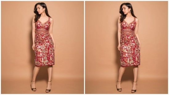 Her dress, crafted in a striking red hue, is a true masterpiece. Hand-painted in Pichhwai style and adorned with signature gota patti embroidery, it features elegant bird and tree motifs inspired by the tropics. (Instagram/@shraddhakapoor)