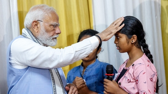 Prime Minister Narendra Modi visits the relief camp to meet and interact with the victims and survivors of the landslide, in Wayanad on Saturday. (ANI)