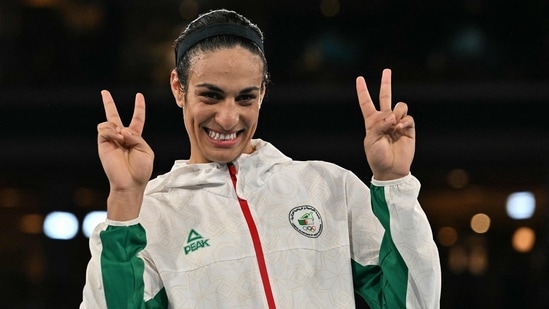 Paris Olympics gold medallist Algeria's Imane Khelif poses on the podium(AFP)