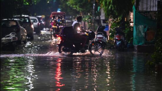 To prevent water logging situation, directions have been issued to remove encroachments from drains, developing footpath crossdrain to manage waterflow, and raising the height of the culvert in Sector 62, Khoda road. (Sunil Ghosh/HT Photo)