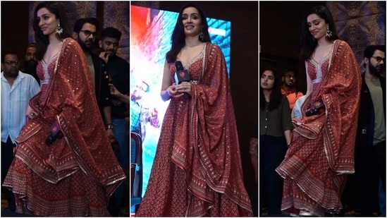 Shraddha Kapoor dazzled in a sequinned kalamkari anarkali and ghaghra set while promoting Stree 2 with Rajkummar Rao. She styled the ensemble with a matching embellished dupatta, loose tresses, silver jhumkis, a nath, and kohl-lined eyes. (Instagram)