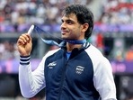 India's Javelin thrower Neeraj Chopra poses for a picture with his silver medal at the Paris Olympics 2024
