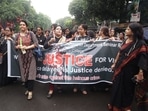 Hospital doctors take part in a candlelight protest march against the death and sexual assault of a female post-graduate trainee doctor, in Kolkata. Hospital doctors take part in a candlelight protest march against the death and sexual assault of a female post-graduate trainee doctor, in Kolkata.
