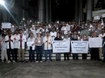 Doctors hold a candle march against the sexual assault and murder of a female postgraduate trainee doctor in Kolkata RG Kar Medical College.