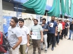 NEET PG Exam 2024 Live: Candidates standing in queue ahead of the second shift of NEET PG 2024 at an examination centre at Patliputra in Patna. (Photo by Santosh Kumar)