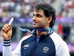 India's javelin thrower Neeraj Chopra poses for a picture with his silver medal at the Paris Olympics. (ANI) India's javelin thrower Neeraj Chopra poses for a picture with his silver medal at the Paris Olympics. (ANI)