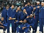 USA's men's basketball team poses with the gold medal at Paris Olympics USA's men's basketball team poses with the gold medal at Paris Olympics