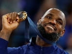 Paris 2024 Olympics - Basketball - Men's Victory Ceremony - Bercy Arena, Paris, France - August 10, 2024. Gold medallist Lebron James of United States poses with his medal.