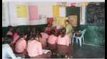 A teacher with her students at a government primary school in Prayagraj. (File) A teacher with her students at a government primary school in Prayagraj. (File)