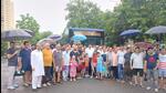 Residents gathered at the launch of extended bus service in sector 92 at Sare Homes condominium. (HT Photo) Residents gathered at the launch of extended bus service in sector 92 at Sare Homes condominium. (HT Photo)