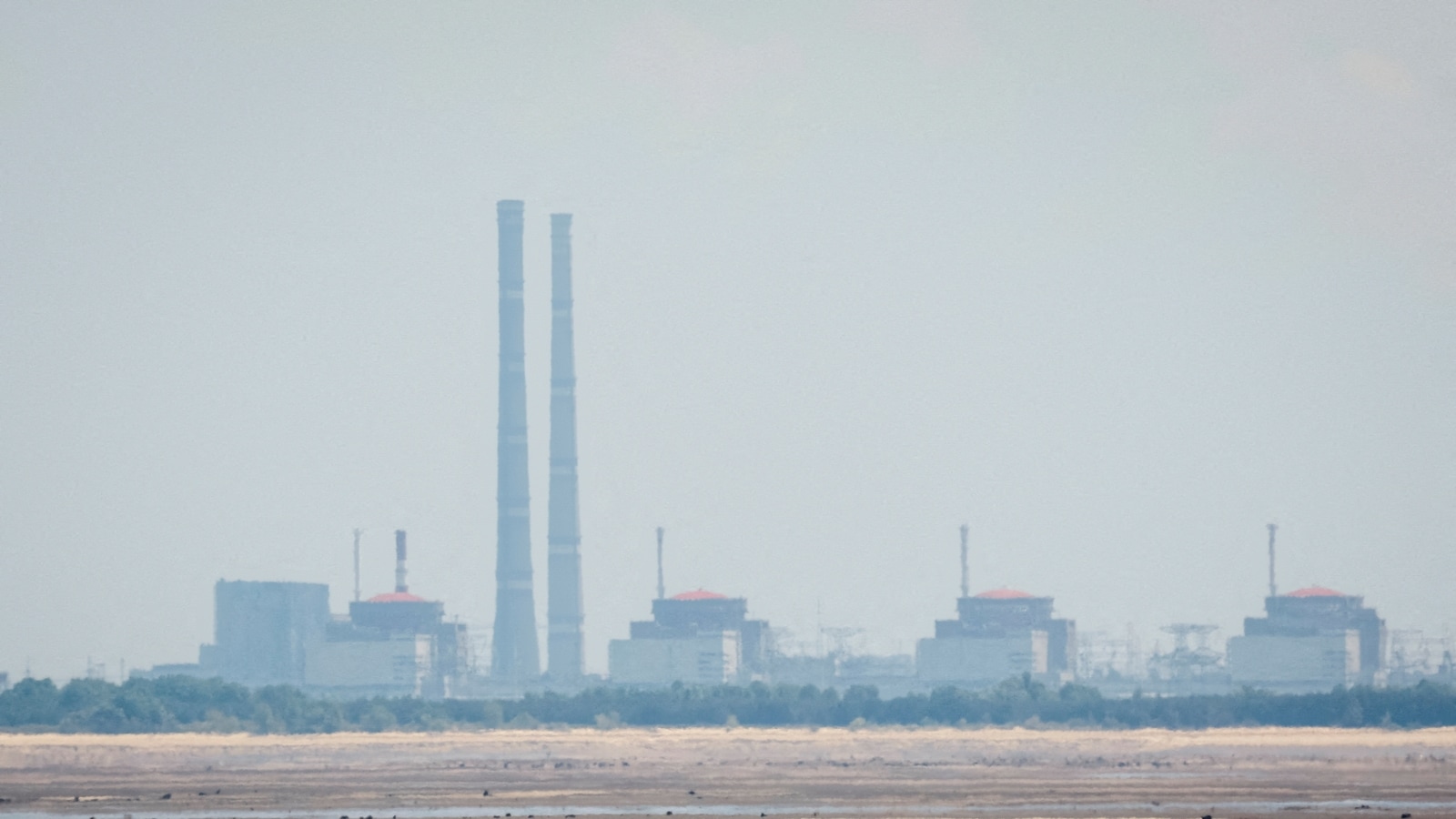 Ukraine: Fire at cooling tower of Zaporizhzhia nuclear plant | World News